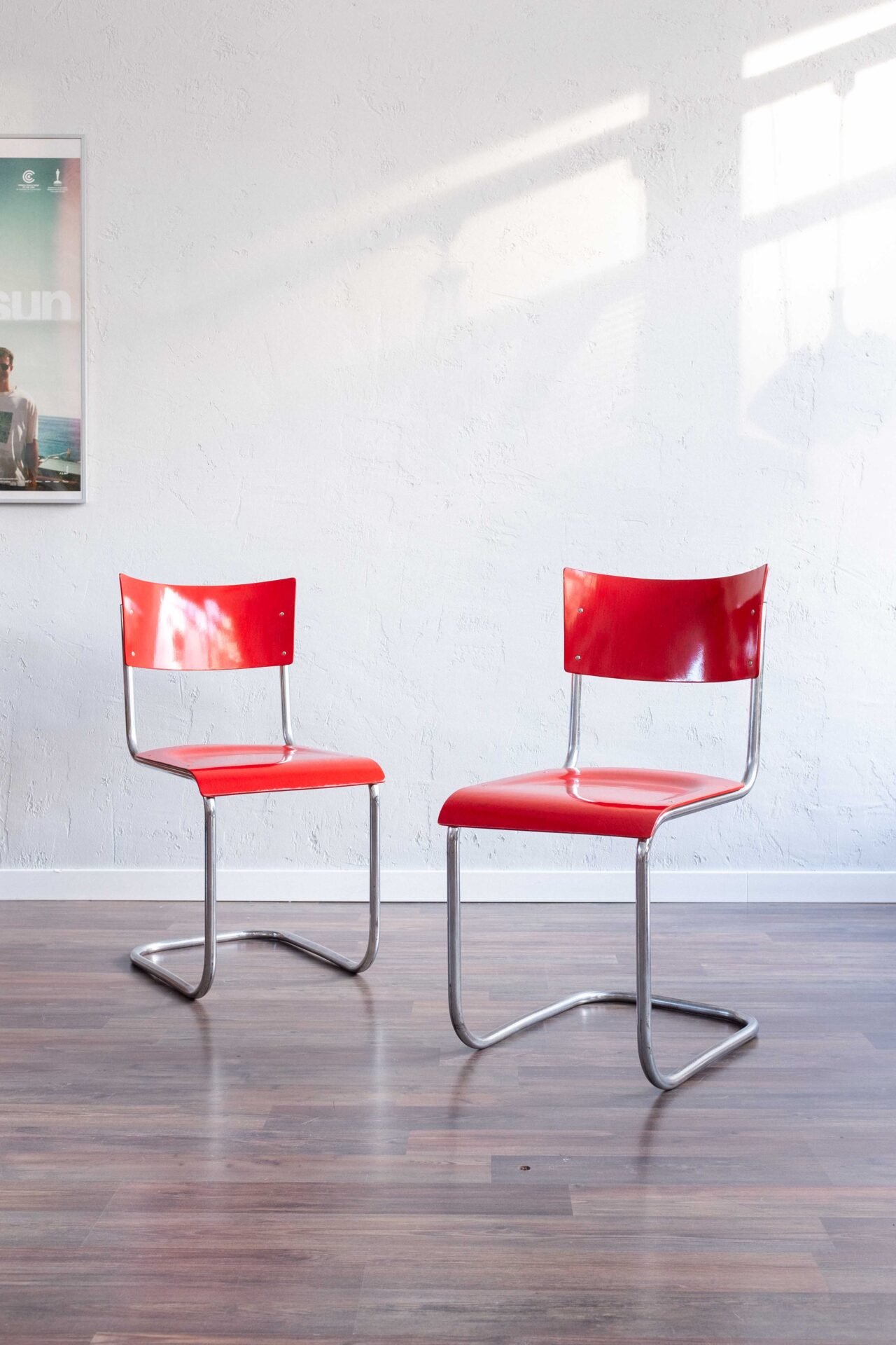 Functionalist Red Chrome Chairs